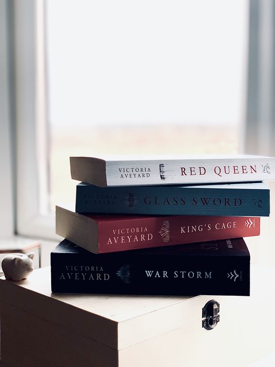 red-queen-series-stacked-by-window